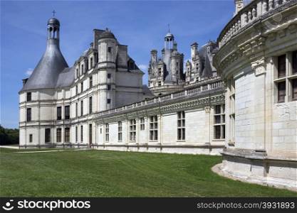 Chateau de Chambord with the River Cosson in the foreground in the Loire Valley in France. The 440 room chateau dates from 1519 and is the largest in the Loire.