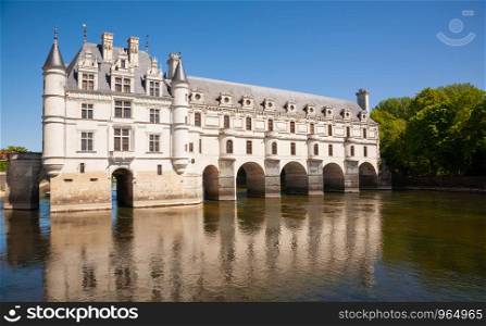 Chateau de Chenonceau over the river in Loire Valley, France. Chateau de Chenonceau