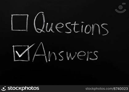 Check boxes of questions and answers on a blackboard