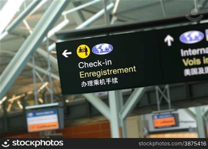 Check in sign at YVR airport
