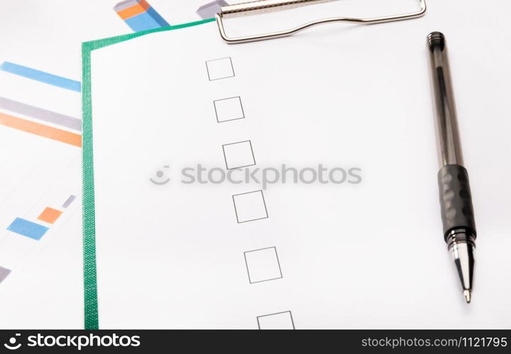 Check list and a pen, business concept.. Check list and a pen, business concept