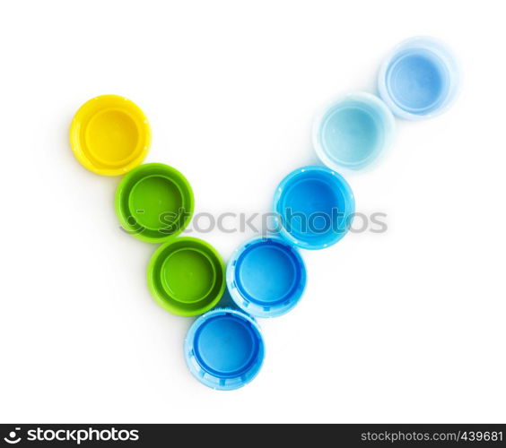 Check mark from the caps of the bottles isolated on white background