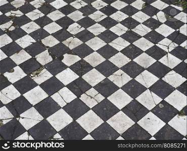 Checkered floor texture. Vintage black and white checkered floor useful as a background