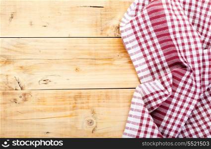 checkered tablecloth on brown wooden table
