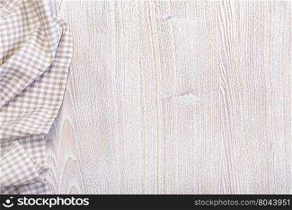 checkered tablecloth on wooden table top view