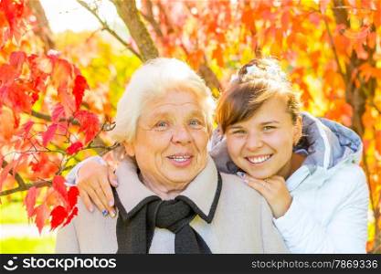 cheerful and happy girl and her grandmother