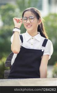 cheerful asian teenager wearing eyes glasses laughing happiness emotion