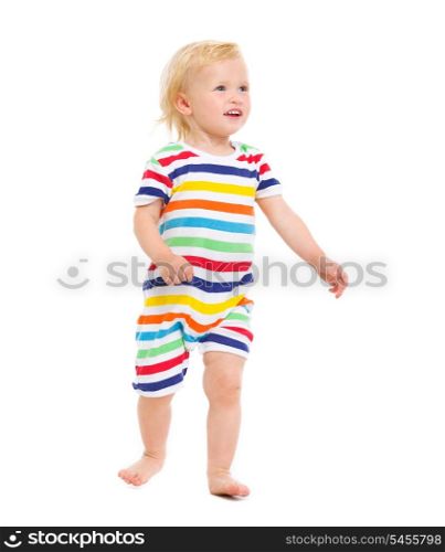 Cheerful baby in swimsuit looking on copy space