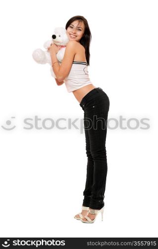 Cheerful beautiful girl with a teddybear. Isolated