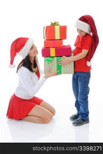 Cheerful boy and woman in Santa Claus hat. Isolated on white background