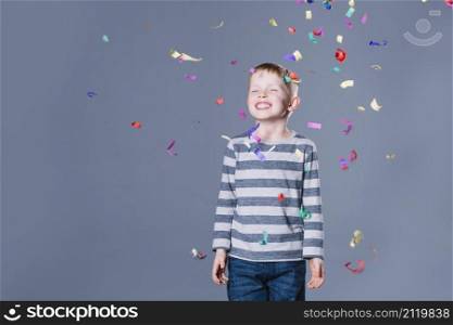 cheerful boy confetti