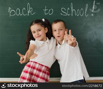 cheerful boy girl blackboard