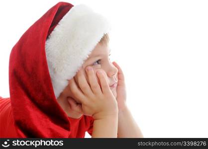 Cheerful boy in Santa Claus hat. Isolated on white background