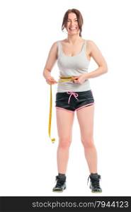 cheerful brunette with a measuring tape on a white background