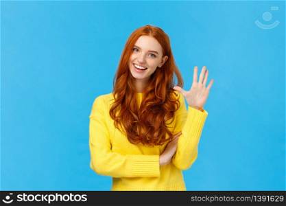 Cheerful, charismatic friendly redhead female showing high five, number fifth as making order, reservation or booking place for party, counting, standing blue background carefree in yellow sweater.. Cheerful, charismatic friendly redhead female showing high five, number fifth as making order, reservation or booking place for party, counting, standing blue background carefree in yellow sweater