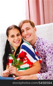 Cheerful couple in love enjoying themselves at home&#xA;