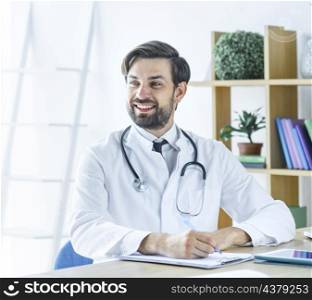 cheerful doctor making notes looking away