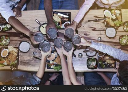 Cheerful friendship, team are dining on holiday or success busin. Cheerful friendship, team are dining on holiday or success business celebration party.