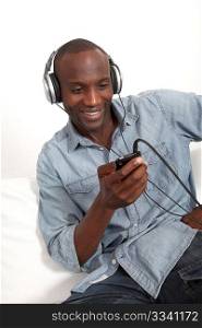 Cheerful man listening to music