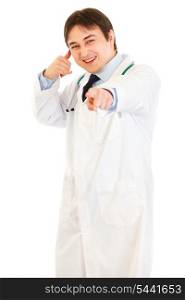 Cheerful medical doctor showing contact me gesture isolated on white&#xA;