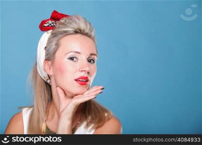 Cheerful pin up girl - retro style portrait blue background