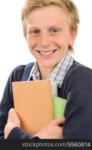 Cheerful teenage student boy holding books against white background