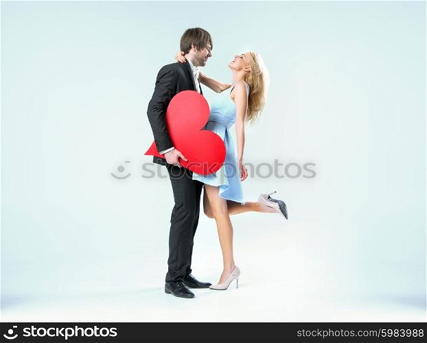 Cheerful valentine&rsquo;s couple in the hug
