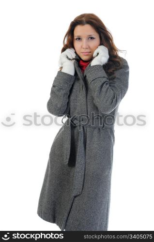 Cheerful woman in the coat. isolated on a white background