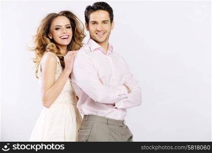 Cheerful young couple having great time together