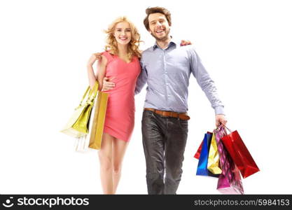 Cheerful young couple on the shopping