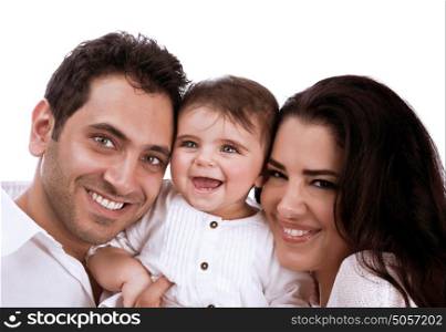 Cheerful young family portrait in the studio, happy parents with sweet little baby girl isolated on white background, love concept