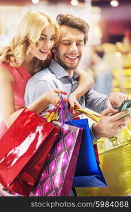 Cheerful young people during the shopping