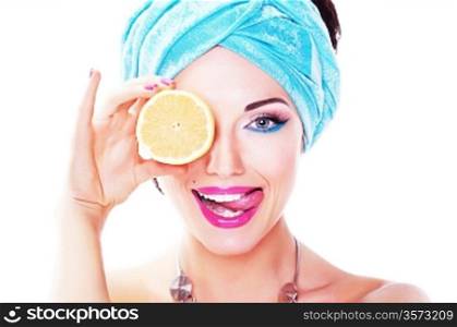 Cheerful young woman holding juicy delicious lemon (orange)