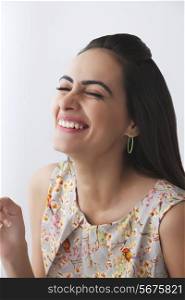 Cheerful young woman over white background