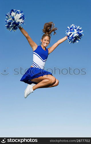 Cheerleader Jumping in Mid-Air