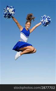 Cheerleader Jumping in Mid-Air