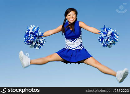 Cheerleader Performing Cheer in Mid-Air