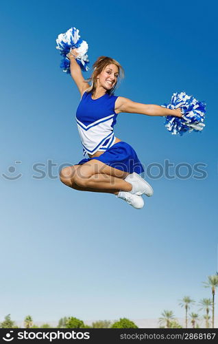 Cheerleader Performing Cheer in Mid-Air