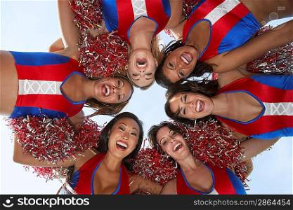 Cheerleaders in a Huddle