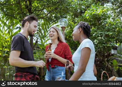 Cheers, Group of people cheering with beer for drinking and discuss about dinner party in nature outdoor as summer lifestyle