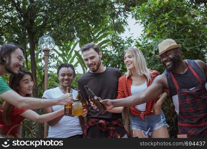 Cheers, Group of people cheering with beer for drinking in nature outdoor as summer lifestyle