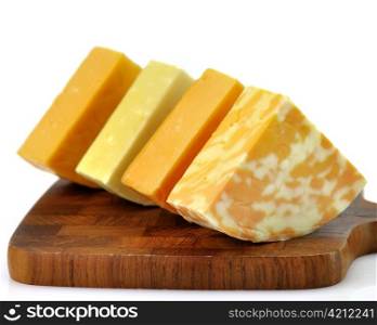 cheese assortment on a cutting board