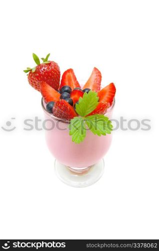 cheese dessert with strawberries and blueberries isolated on white