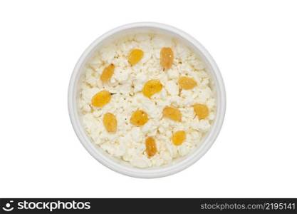cheese in plastic container isolated on white background with raisins. cheese in plastic container with raisins