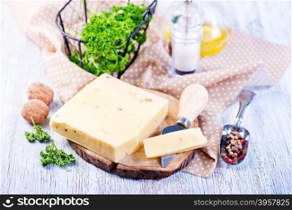 cheese on board and on a table