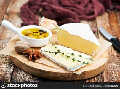 cheese on board and on a table