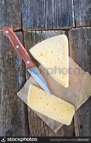 cheese on paper and on a table