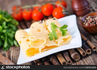 cheese on plate and on a table
