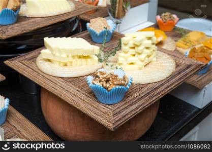 Cheese on wooden table