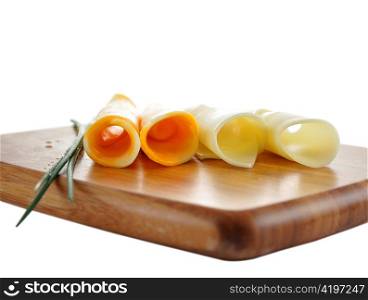 cheese slices on a cutting board